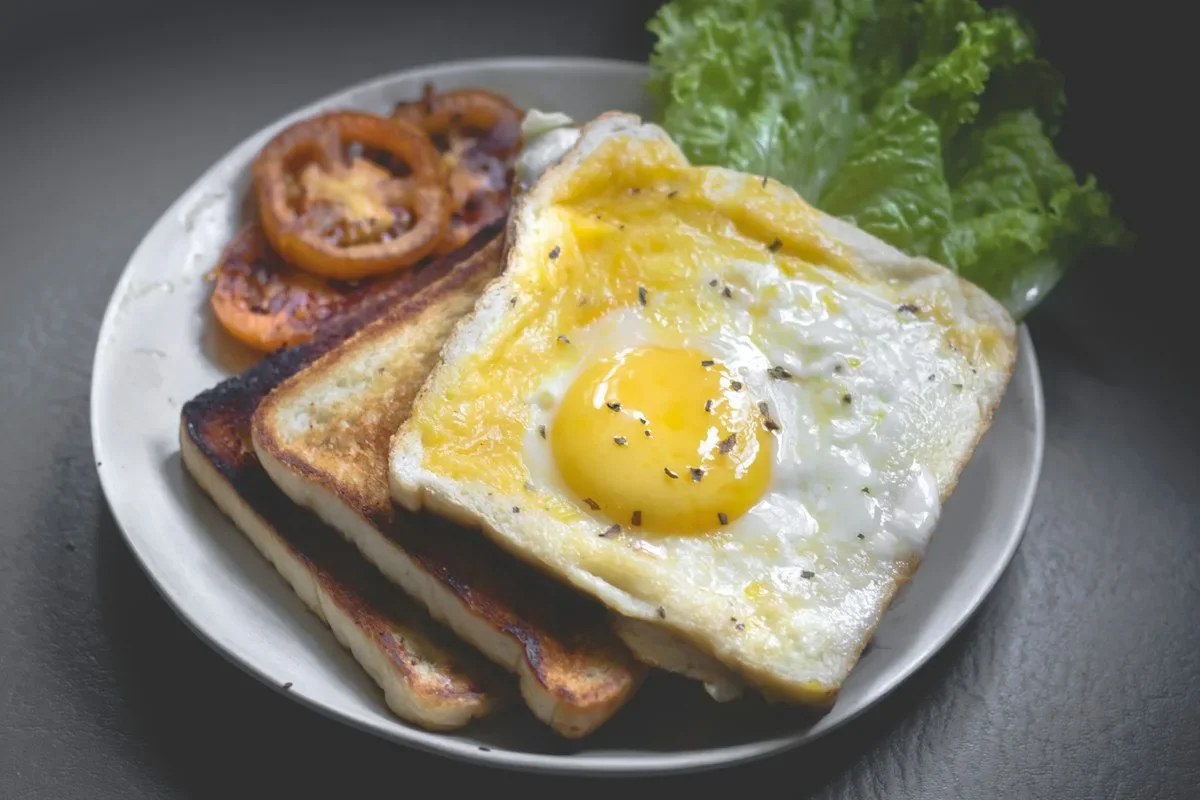 Wholesome everyday breakfast meal with fresh fruits, eggs, and oats
